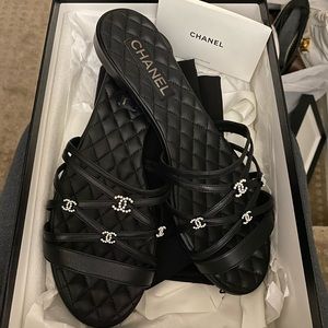Chanel size 42 black mules. Fits US 10